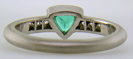 Inside view of Paraiba tourmaline accented with diamonds in a custom platinum ring.