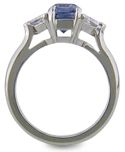 Hand-crafted platinum ring with a emerald-cut pastel Sapphire and sparkling diamonds. (J8541)