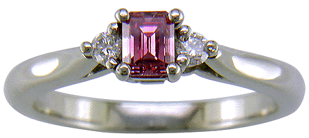 Fancy intense purplish-pink diamond set in a handcrafted platinum ring.