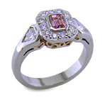 Fancy Intense purplish-pink diamond set in a handcrafted platinum ring. (J7260)