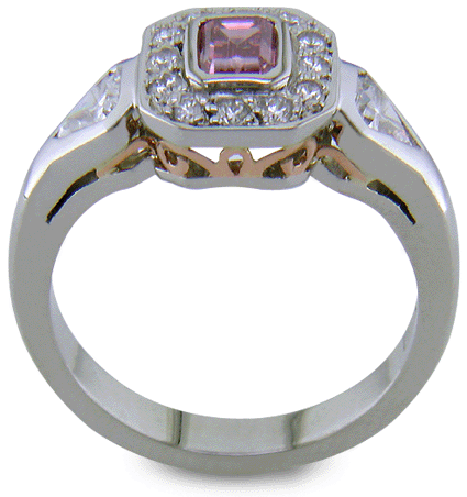 Side view of handcrafted platinum ring with Purplish-Pink diamond. (J7260)