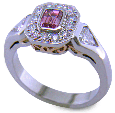 Fancy Intense Purplish-Pink diamond set in a handcrafted platinum ring. (J7260)