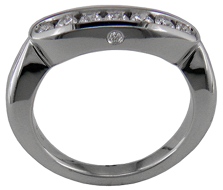 Custom created platinum band showing small diamond burnish-set in the outer wall.