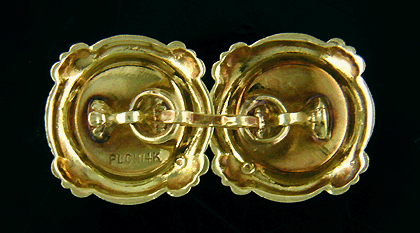 Back of elegantly engraved antique cufflinks crafted in platinum and gold. (J7203)