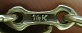 Close-up of precious metal and maker marks. (J8685)