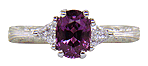 Plum Sapphire and trilliant diamond hand-engraved platinum ring.