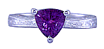 Hand engraved platinum ring with a trillium purple sapphire.