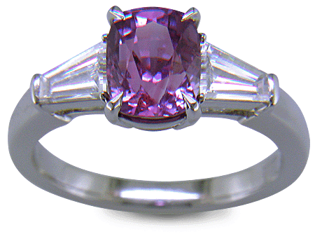 Purple Sapphire with tapered baguette diamonds in a custom platinum ring. (J8644)