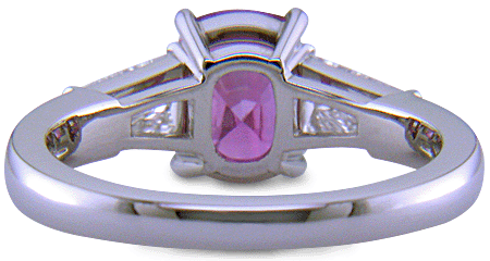 Purple Sapphire with tapered baguette diamonds in a custom platinum ring. (J8644)