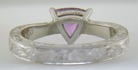 Inside view of platinum ring with a trillium Purple Sapphire.