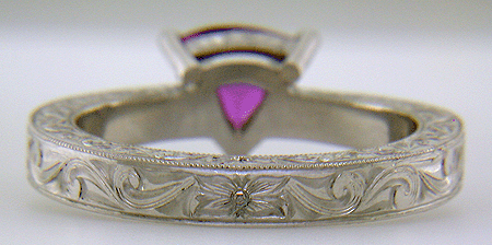 Inside view of hand engraved platinum ring with a trillium purple sapphire.