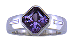 Purple sapphire and diamond handcrafted platinum ring.