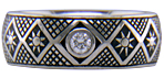 Hand engraved Pysanky ring with diamonds.