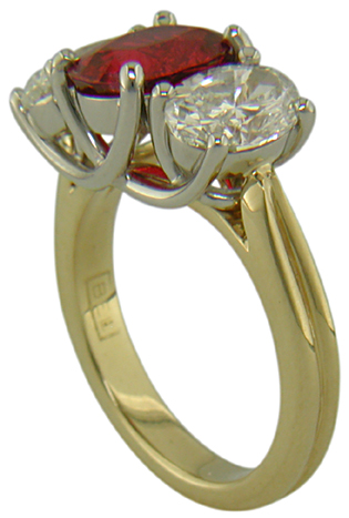 Red Spinel trellis ring set with diamonds.