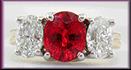 Red Spinel trellis ring set with diamonds.