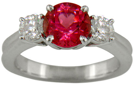 A Red spinel set with two ideal-cut diamonds in a beautiful platinum ring. (J7240)