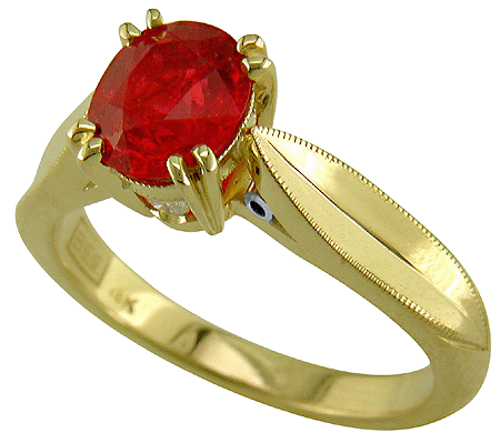 18kt gold engagement ring with a red spinel and two diamonds. (J5319)