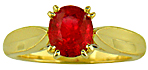 18kt gold ring with a red spinel and two diamonds.