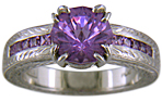 Lavender spinel set with sparkling lilac sapphires in a beautifully hand-engraved platinum ring.