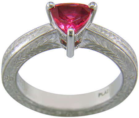Hand engraved platinum ring with a trillium red spinel.