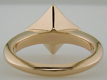 A Rhodolite Garnet set in a handcrafted rose gold ring. (J8701)