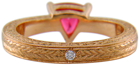 Inside view of hand engraved rose gold ring with a trillium red spinel.