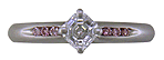 Royal Asscher diamond set with Fancy Vivid pink diamonds in a custom platinum ring.