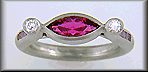 Hand-crafted platinum ring set with a Rubellite Tourmaline and diamonds.
