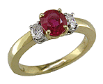 Ruby and diamond engagement rings in 18kt gold.