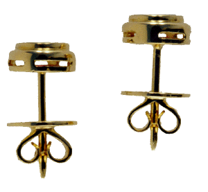 Side-view of ruby earrings in 18kt gold.