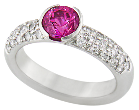 Pink sapphire and pavé-set diamonds platinum ring.
