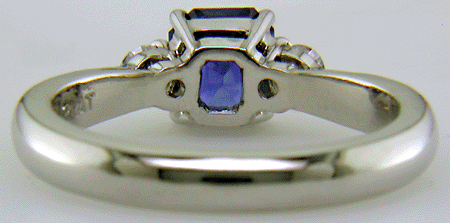 Inside view of handcrafted platinum ring with Emerald-cut sapphire.