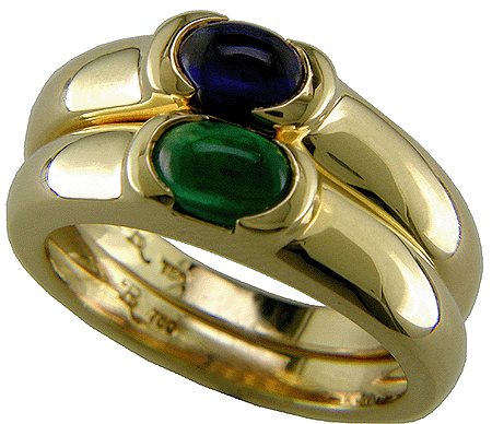 Cabochon sapphire and emerald rings in 18kt gold.