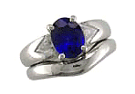 Sapphire and trilliant diamond engagement rings custom designed in platinum with matching wedding band.