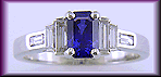 Platinum sapphire and diamond ring. (J3867)