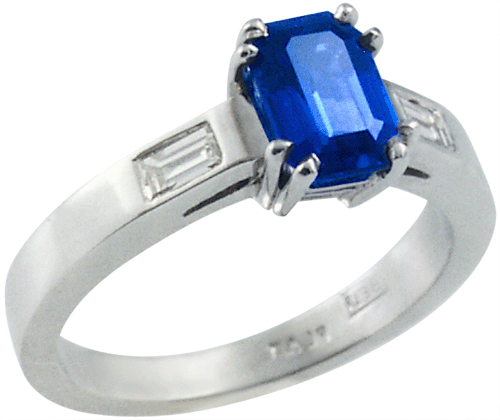 Emerald cut sapphire and baguette diamonds in a custom platinum engagement ring.