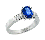 Emerald cut sapphire and baguette diamonds in a custom platinum ring.