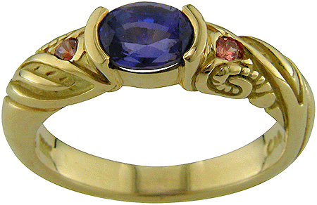 Sapphire set in an 18kt gold ring.