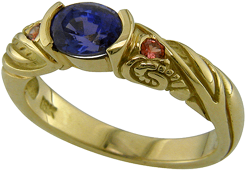 Oval sapphire set in an 18kt gold ring.