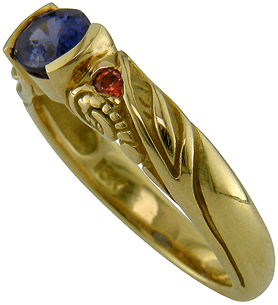 Jungle Dreams ring with oval sapphire.
