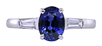 Sapphire Rings - Oval Sapphire set with tapered baguette diamonds in a handcrafted platinum ring. (J8410)
