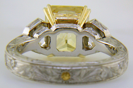 Inside view of Yellow Sapphire and Diamond hand-engraved platinum ring.