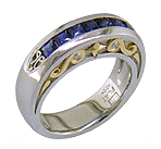 Sapphire Rings - Seven Princess-cut Sapphires set in a platinum ring with diamonds and 18kt gold accents. (J7420)