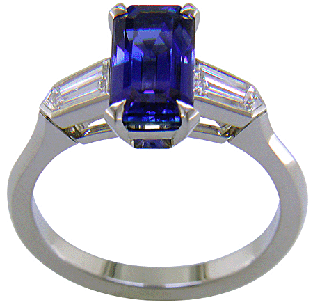 Side view of handcrafted platinum ring with a sriking emerald-cut Sapphire and sparkling bullet-shape diamonds.