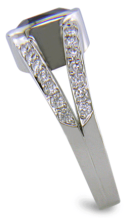 A cushion-cut sapphire set with diamonds in a custom platinum ring.