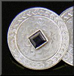 Elegantly engraved sapphire and diamond cufflinks. (J8746)