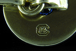 Close up of makers mark on back of cufflinks. (J5340)