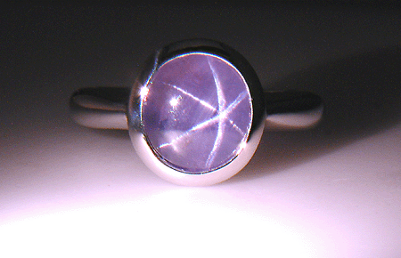 Purple star sapphire ring hand crafted in platinum.