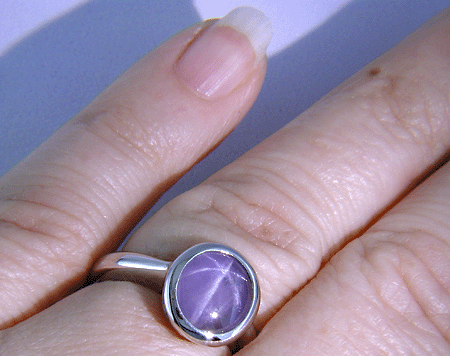 Purple star sapphire ring hand crafted in platinum.