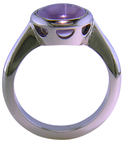 Side view 0f Purple star sapphire ring hand crafted in platinum.